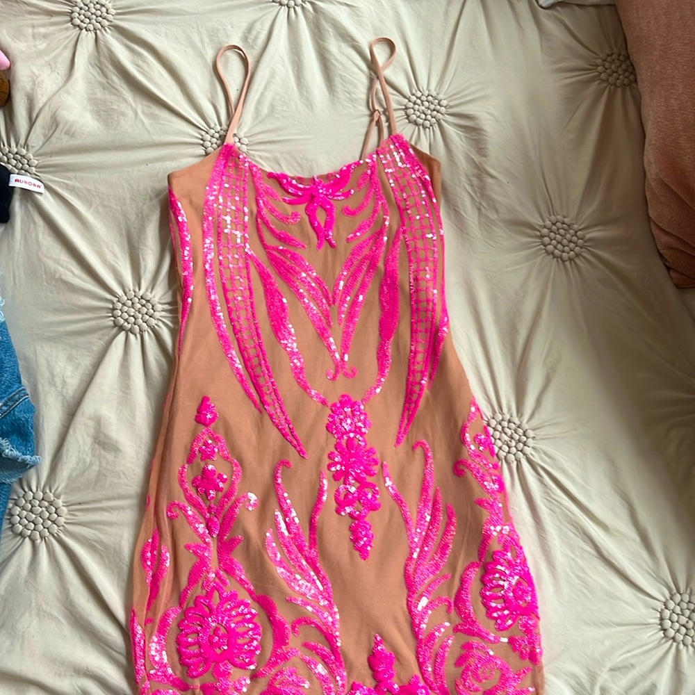 Pink and tan mini dress. No tags but never before warn. In brand new condition.